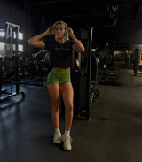Woman exercising in a gym setting